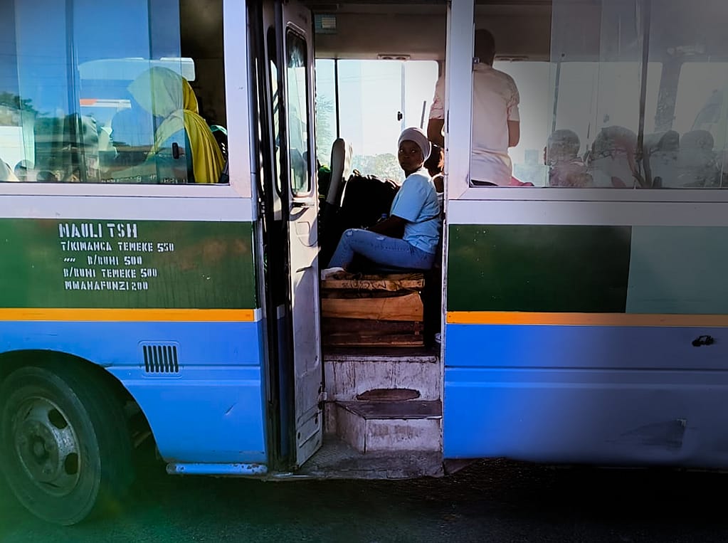 Prices for students and adults are written next to the door