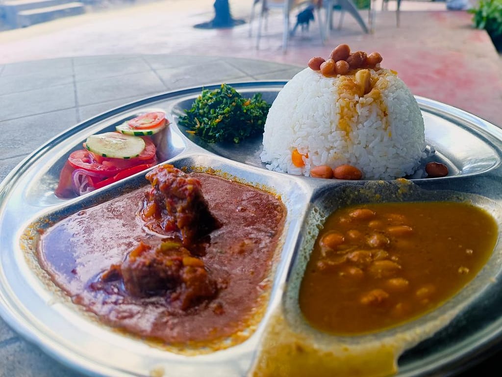 Street Food - Typical meal in Dar es Salaam "Wali ya Marahage"