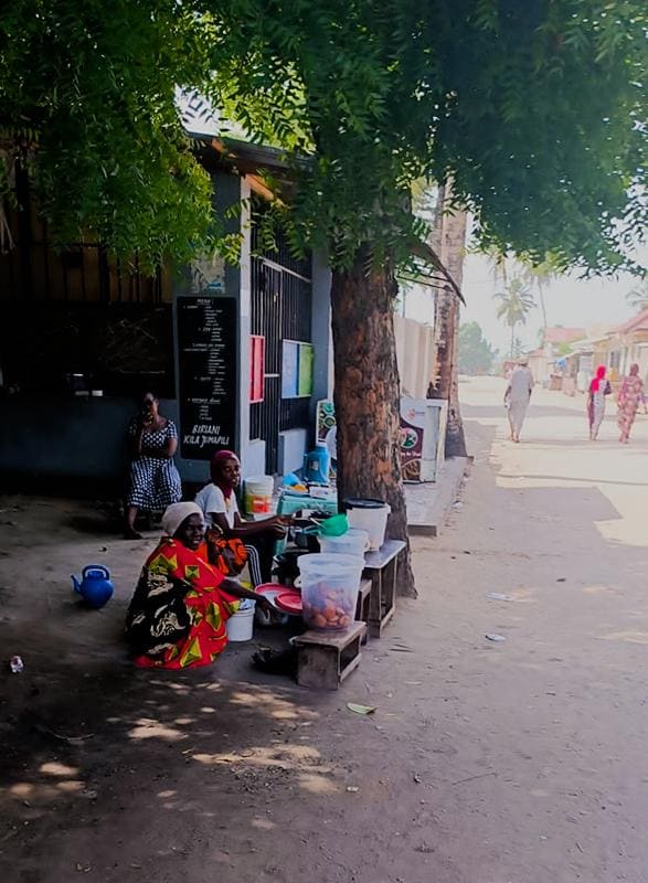 Women selling their homemade snacks